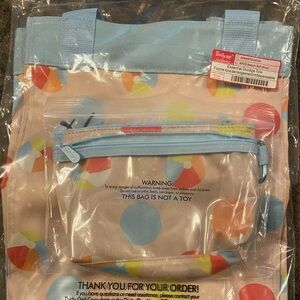 Brand new set - Essential storage tote with matching clear clip pouch